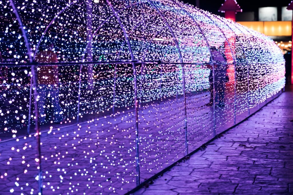 Rideau lumineux LED façade centre commercial 3 mètres hauteur 500 LED blanc chaud effet cascade illumination Noël professionnel Île-de-France